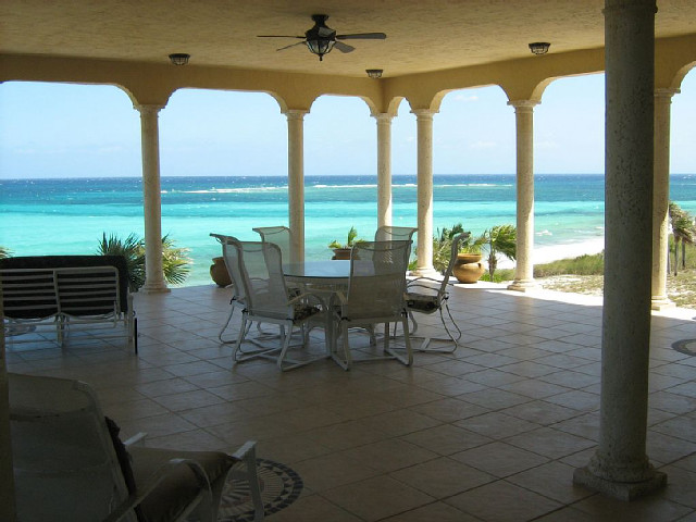Patio table chairs ocean beach free wallpaper - medium preview image