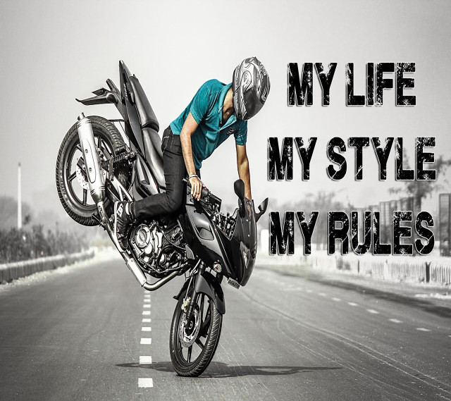 Motorcycle trick man cloudy sky free wallpaper - medium preview image