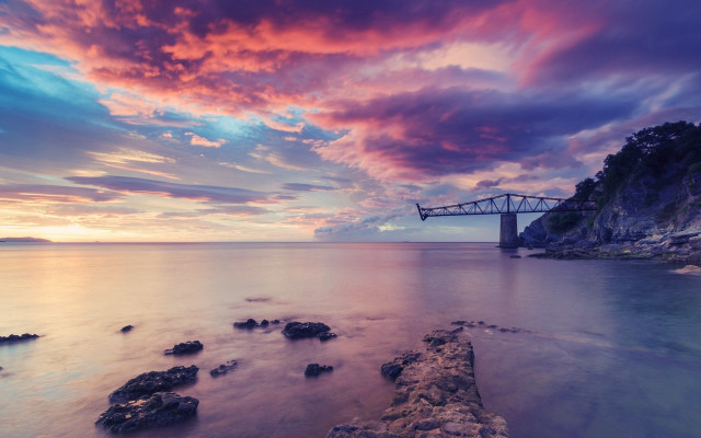 Bridge beach rocks sky cityscape free wallpaper - medium preview image