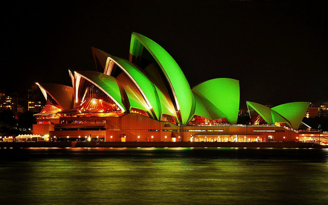Large green building night lights free wallpaper for desktop - medium preview image