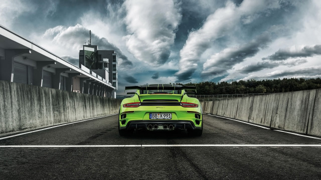 Green sports car cloudy sky free wallpaper - medium preview image