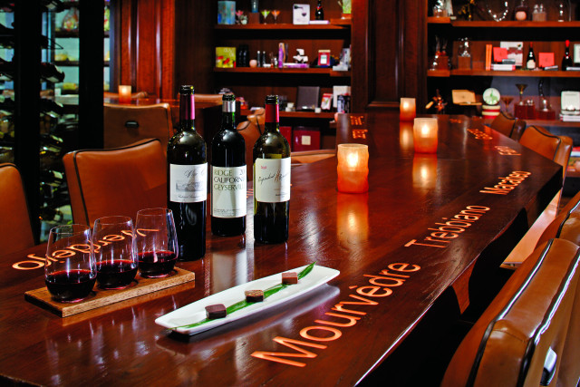 Wine glasses bottles candles restaurant free wallpaper - medium preview image