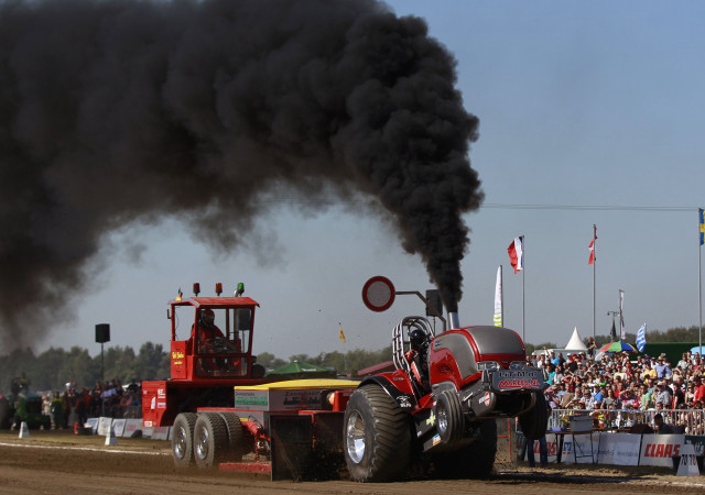 Tractor pulling trailer black smoke free wallpaper - medium preview image