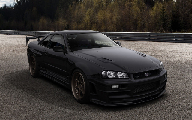 Black sports car parked forest free wallpaper - medium preview image