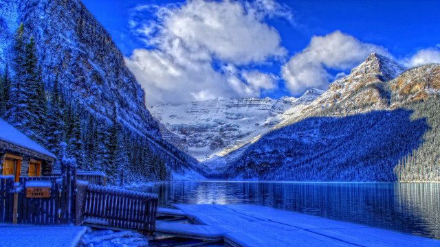 Snowy mountain lake dock cabin free wallpaper - medium preview image