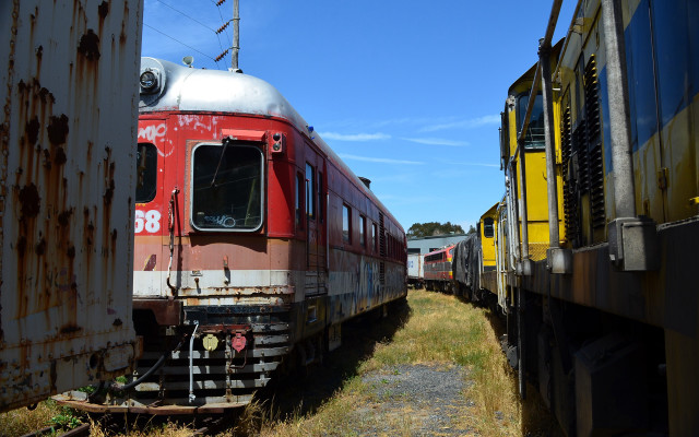 Train parked tracks field grass free wallpaper - medium preview image