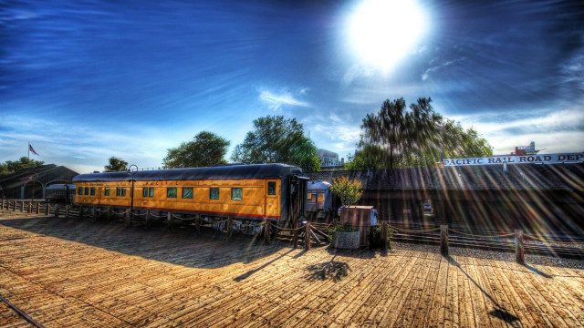 Train parked tracks fence trees free wallpaper - medium preview image