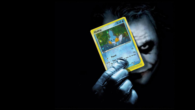 Man holding joker card batman free wallpaper - medium preview image