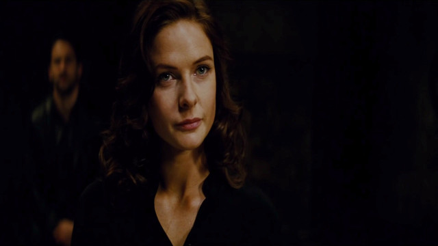 Woman blue eyes dark room free wallpaper - medium preview image