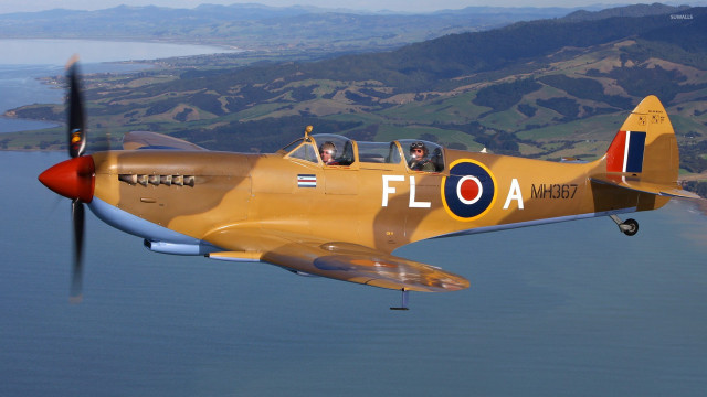 Yellow airplane flying water propeller free wallpaper - medium preview image