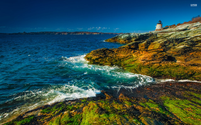 Lighthouse rocky cliff ocean green free wallpaper - medium preview image