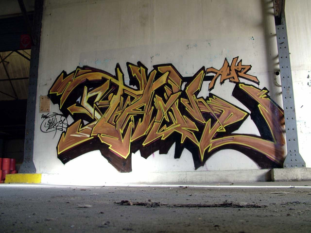 Graffiti wall yellow black sign free wallpaper - medium preview image