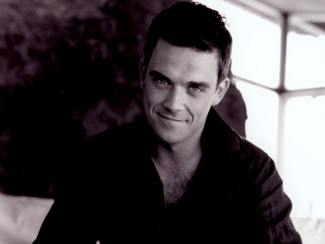 Man smiling couch window wall free wallpaper - medium preview image