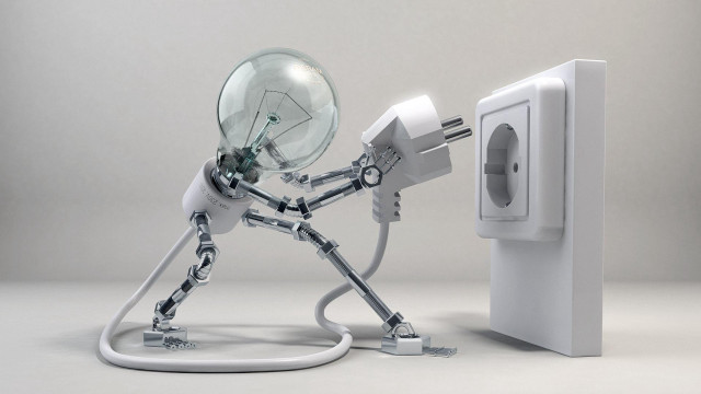 Robot holding light bulb plugged #2 free wallpaper - medium preview image