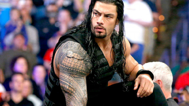 Man tattoo black vest sitting free wallpaper - medium preview image