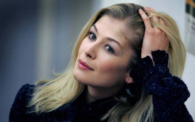 Woman long blonde hair serious free wallpaper - medium preview image