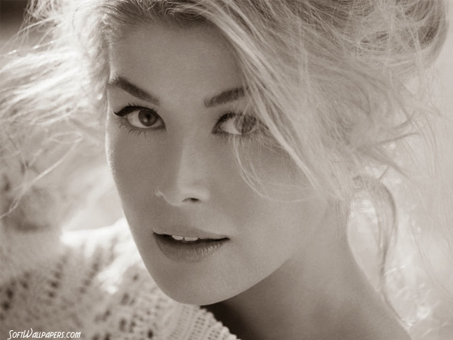 Messy hair sweater blowing wind free wallpaper - medium preview image