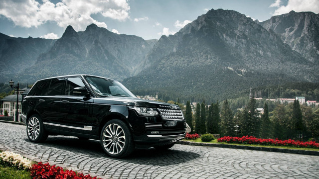 Black range rover cobblestone road free wallpaper - medium preview image