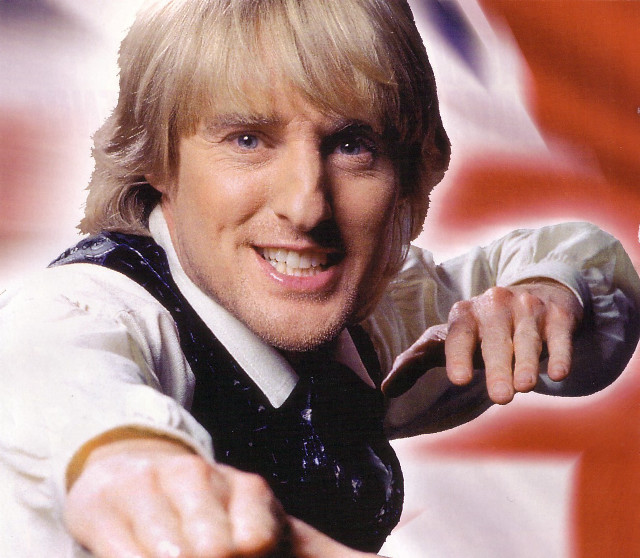 Blonde man pointing british flag free wallpaper - medium preview image