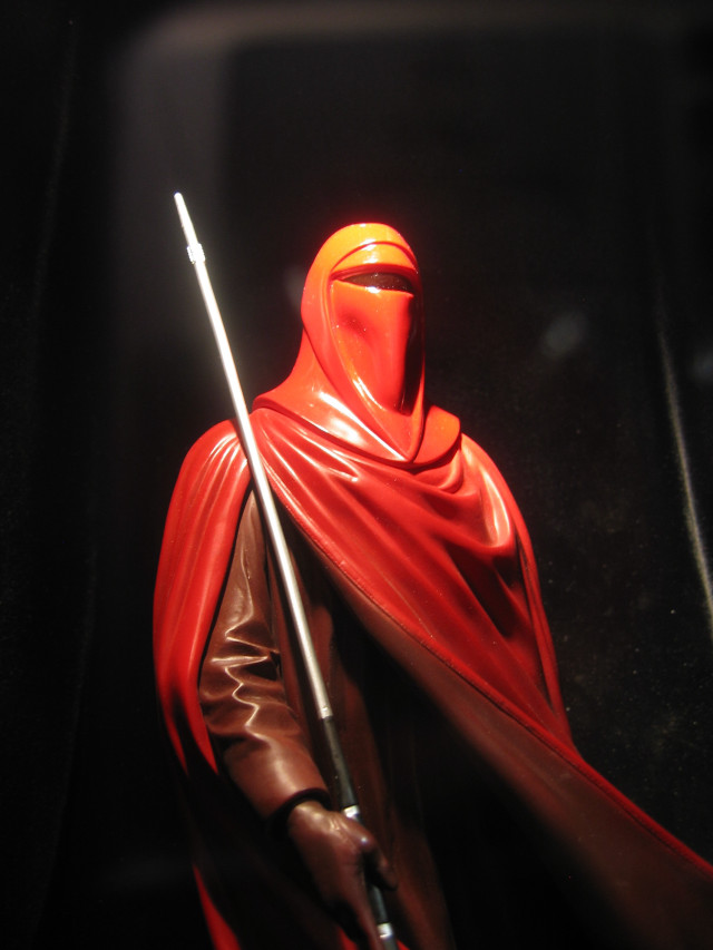 Statue man sword red cloak free wallpaper - medium preview image