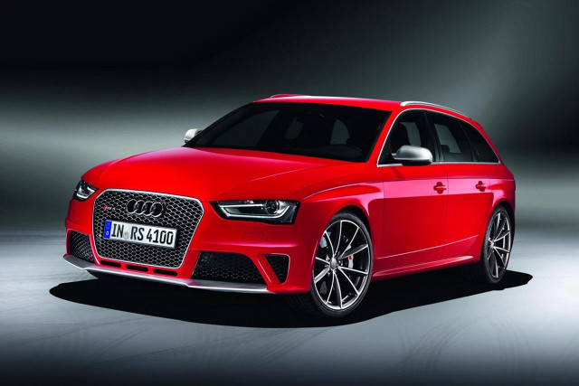 Red car dark room spotlight free wallpaper - medium preview image