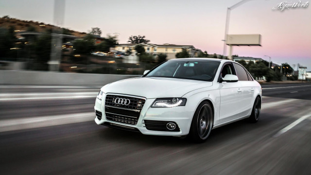 White car driving street sign free wallpaper for desktop - medium preview image