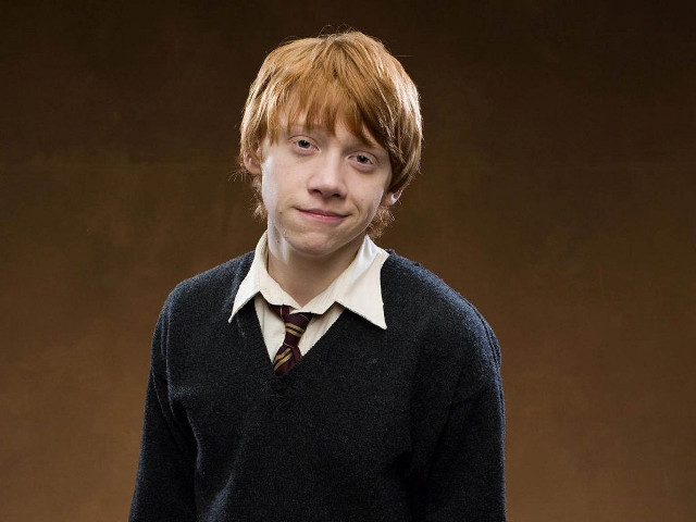 Young man tie sweater posing free wallpaper - medium preview image