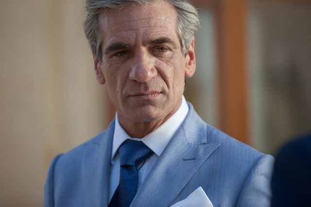 Man suit tie looking outside free wallpaper - medium preview image