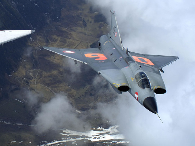 Fighter jet mountain range clouds free wallpaper - medium preview image