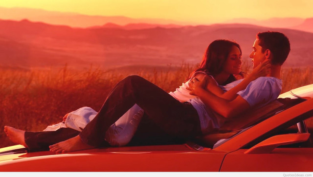 Man woman red car sunset free wallpaper - medium preview image