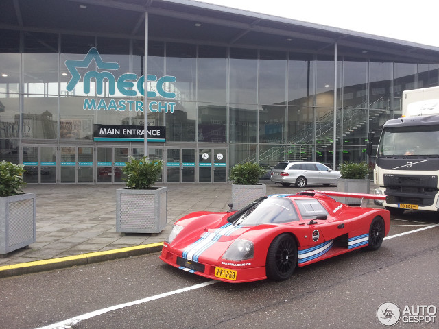 Red race car building bus free wallpaper - medium preview image