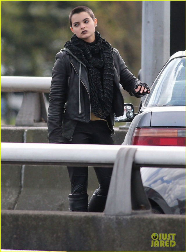 Woman black jacket scarf walking free wallpaper - medium preview image