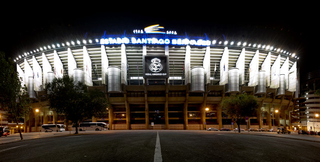 Stadium night sign cars parked free wallpaper - medium preview image