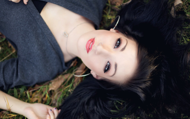 Woman lying on ground black free wallpaper - medium preview image