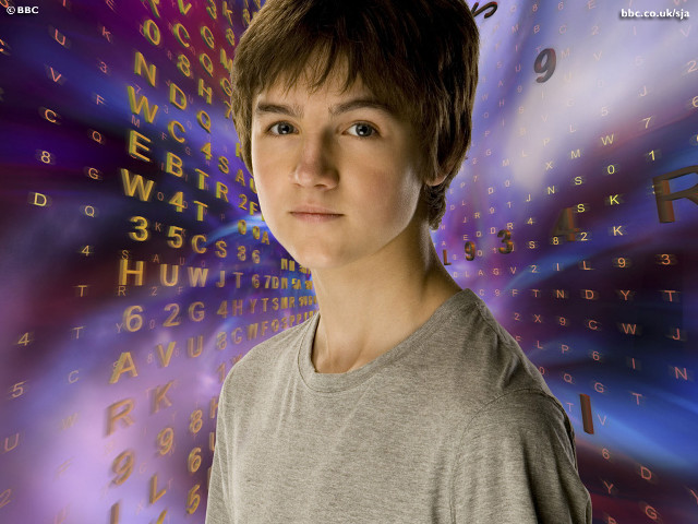 Boy standing wall letters clock free wallpaper - medium preview image