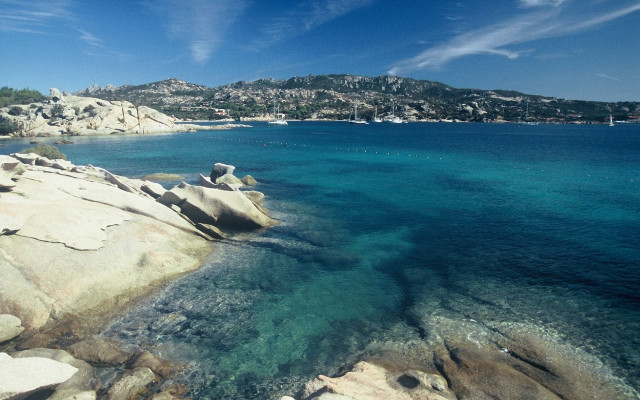 Water rocks mountains boat scenery free wallpaper - medium preview image