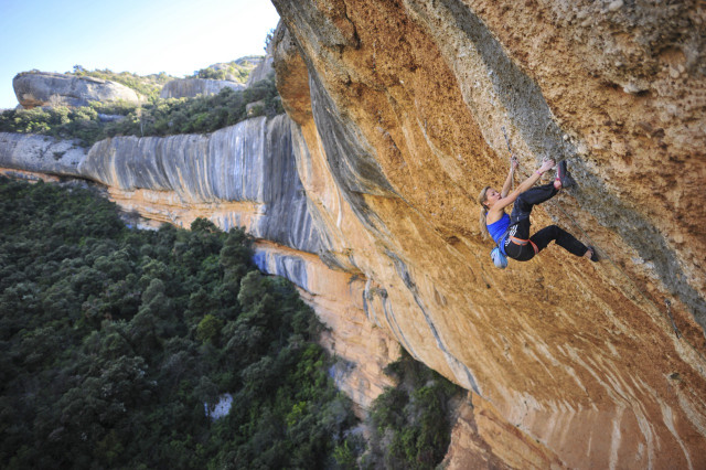Man climbing cliff rope another free wallpaper - medium preview image