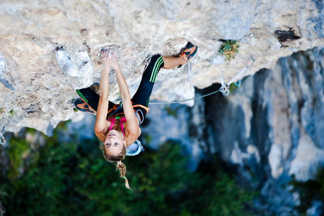 Woman climbing cliff rope helmet free wallpaper - medium preview image