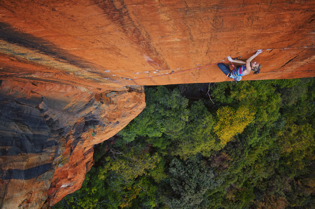 Man rock climbing cliff rope free wallpaper - medium preview image