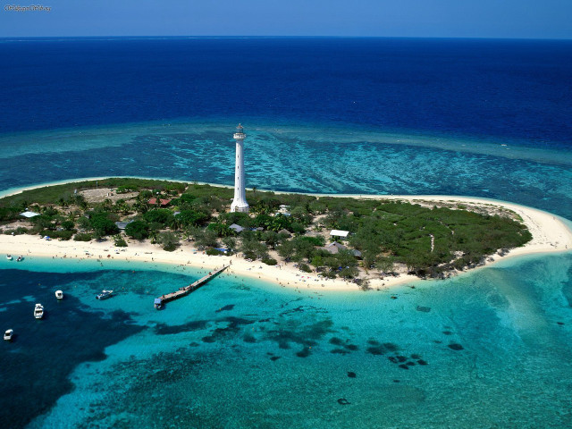 Small island lighthouse boats ocean free wallpaper - medium preview image