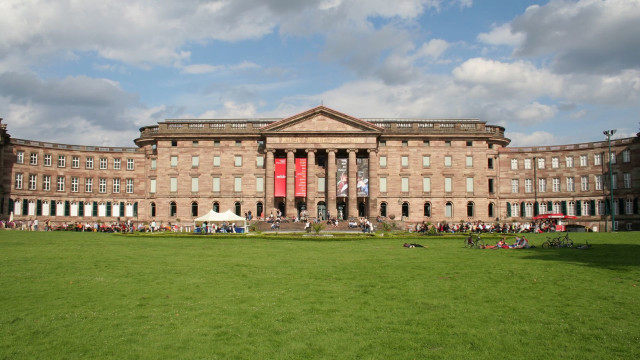 Large building lawn people walking free wallpaper - medium preview image