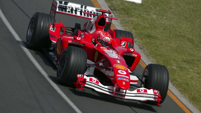 Red race car track grass #4 free wallpaper - medium preview image