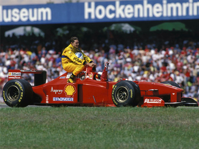 Man red racecar grass crowd free wallpaper - medium preview image