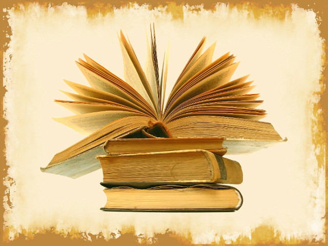 Pile of books on table free wallpaper - medium preview image