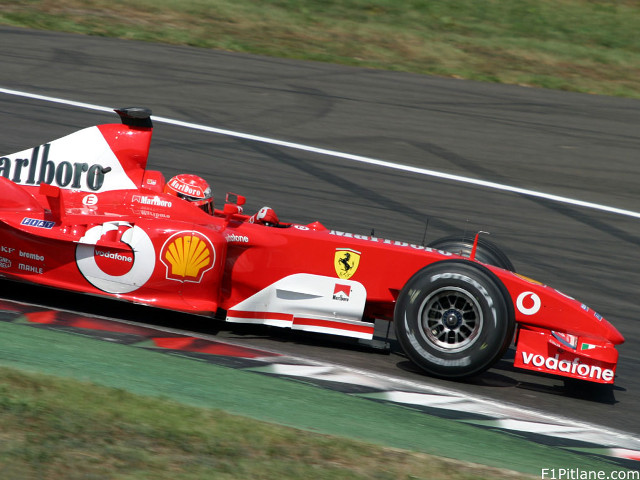 Red race car track grass #3 free wallpaper - medium preview image