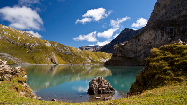 Mountain lake green hillside clouds free wallpaper - medium preview image
