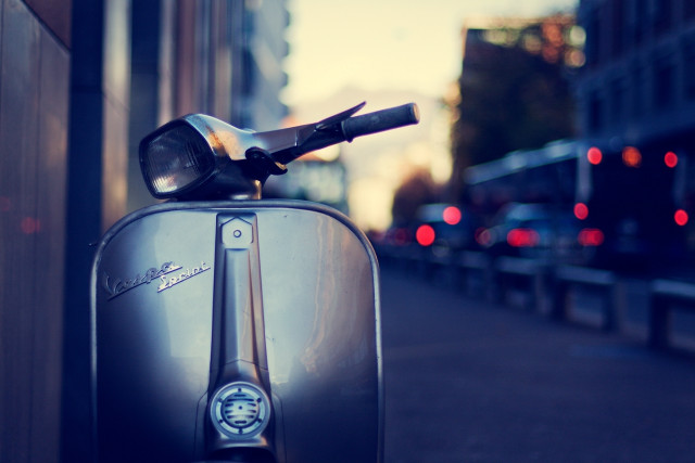 Scooter parked street building streetlight free wallpaper - medium preview image