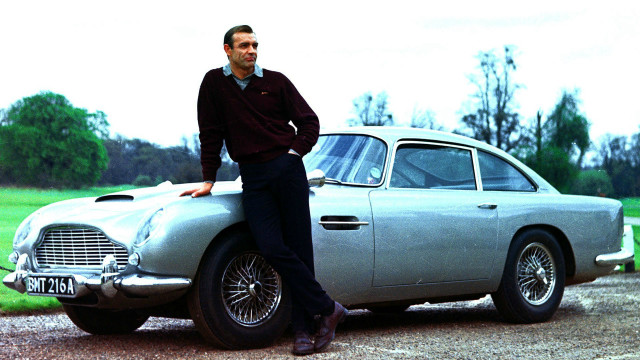 Man leaning car hood driveway free wallpaper - medium preview image