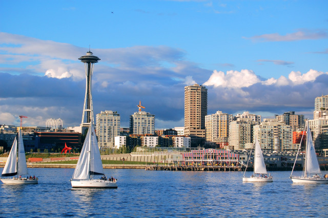 Sailboats city skyline tall buildings free wallpaper - medium preview image