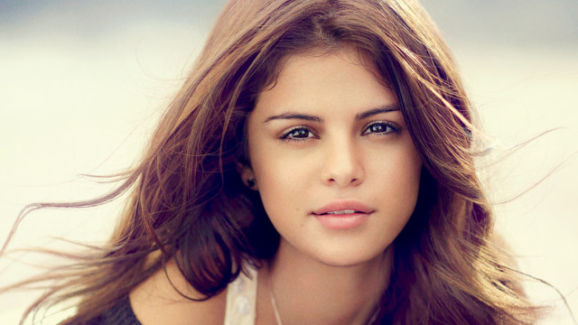 Woman long hair necklace serious #9 free wallpaper - medium preview image